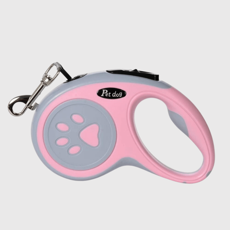 Laisse enrouleur patte de chien rose