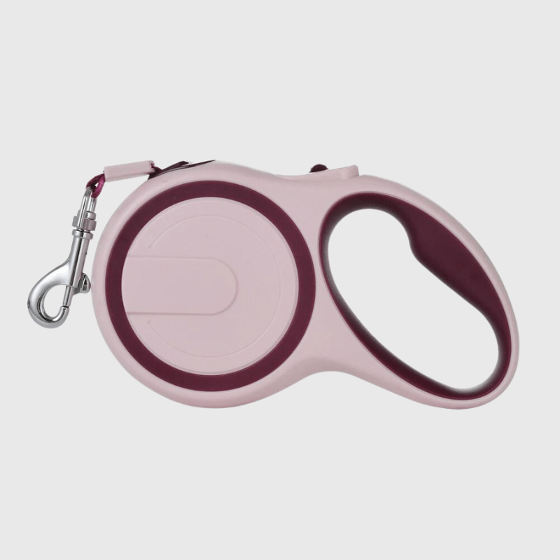 Laisse enrouleur pour chien rose
