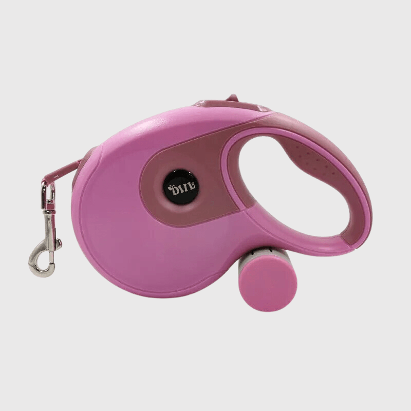 Laisse enrouleur rose pour chien sac à caca