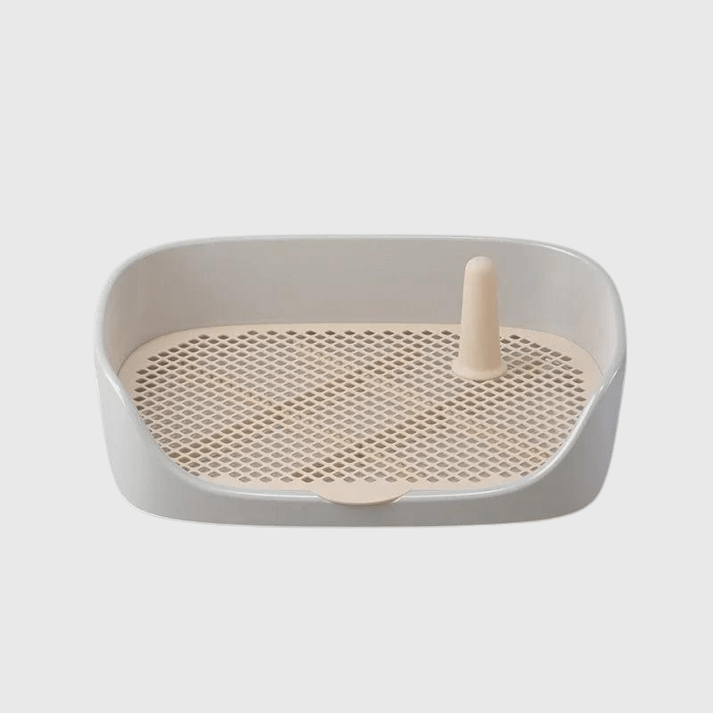 Litière pour chien sur terrasse gris